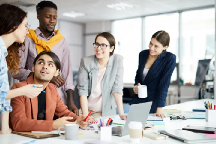 Sysfo team celebrating a successful project launch