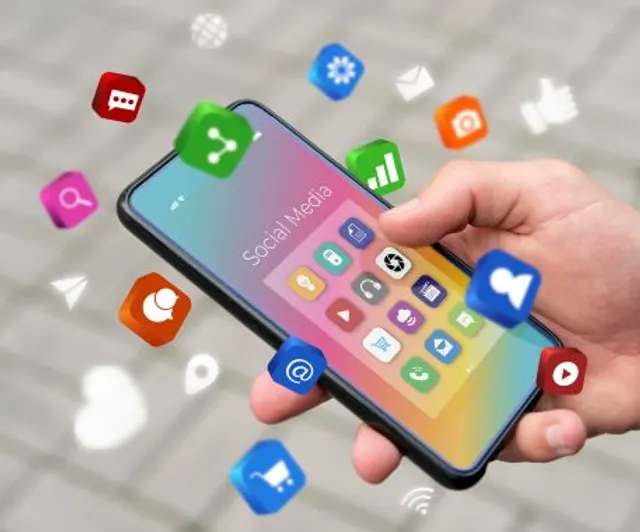 Smartphone showing social media apps used to manage comments and direct messages
