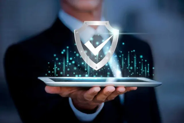 Security shield over a tablet representing WordPress hardening, firewall and malware protection